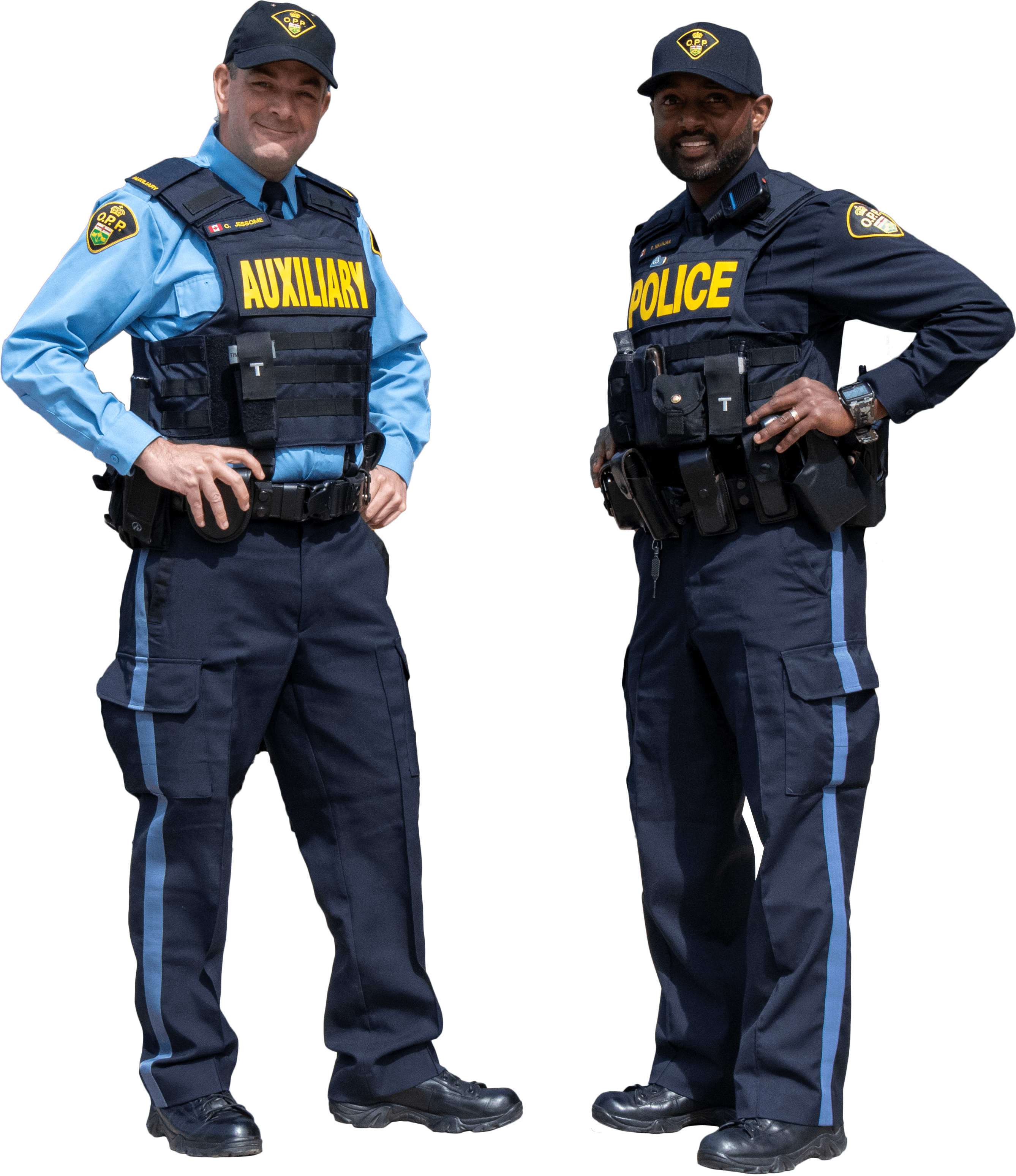 two smiling police officers standing side by side