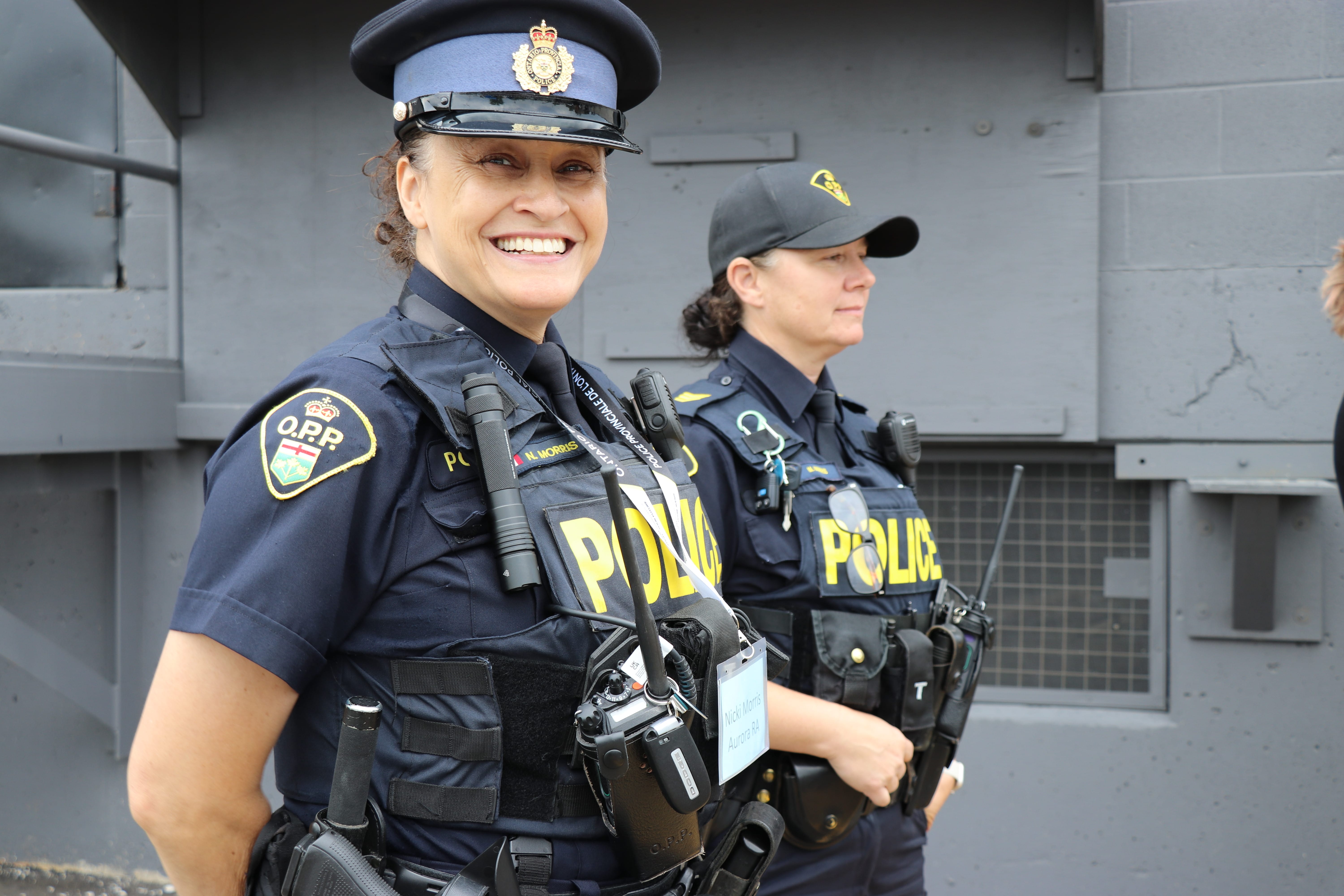an officer smiling in a relaxed stance
